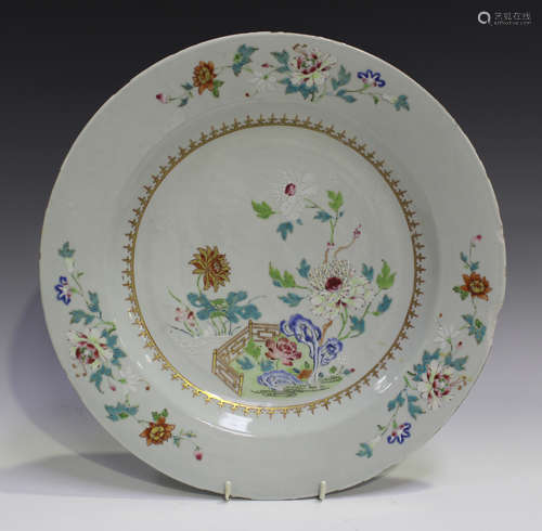 A Chinese famille rose export porcelain circular dish, Qianlong period, the centre painted with a