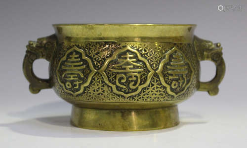 A Chinese polished bronze censer, late Qing dynasty, the bombé circular body cast with six character