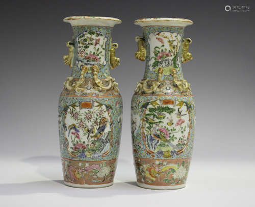 A pair of Chinese famille rose porcelain vases, late 19th century, each shouldered tapering body and