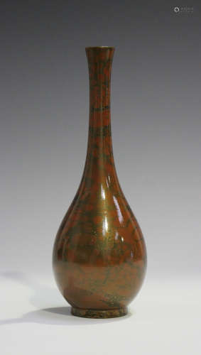 A Japanese iron red and gilt patinated metal bottle vase, 20th century, of slender baluster form,