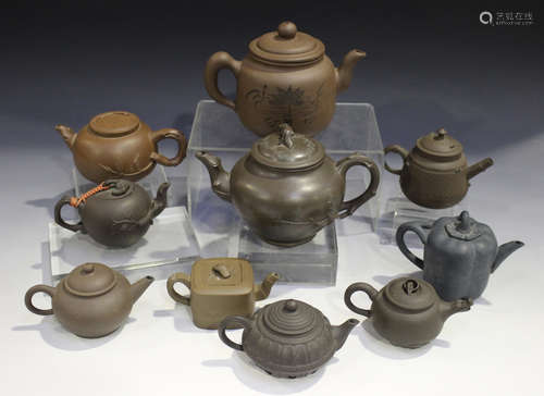 A group of ten Chinese Yixing stoneware teapots and covers, 20th century and modern, including a