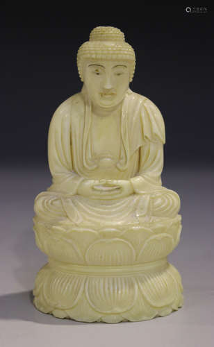 A Japanese carved ivory Buddha, early 20th century, modelled seated on a double lotus throne, height