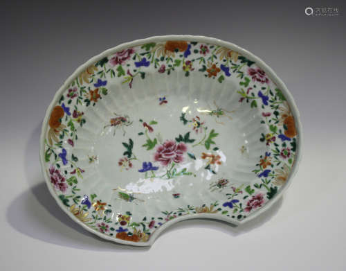A Chinese famille rose export porcelain barber's bowl, Qianlong period, of fluted oval form, painted