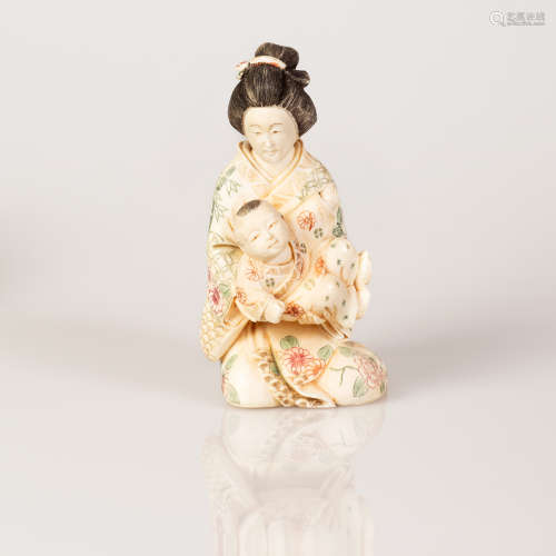 Japanese Bone Sculpture Geisha Holding a Baby Figure