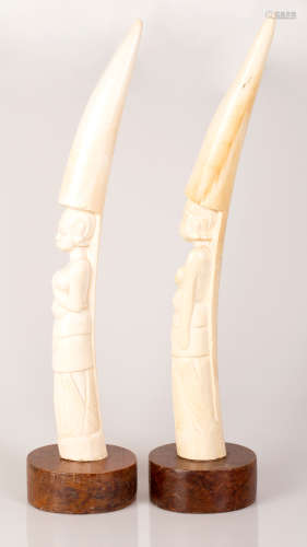Pair of African Bone Tusks Bare-Breasted Girls on Wooden Stand