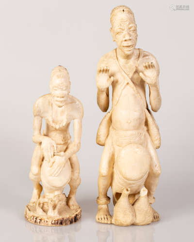 Pair of African Bone Sculptures Drum Players Figure