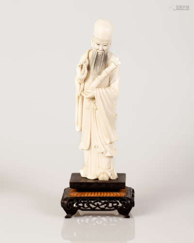 A fine bone sculpture of a wise man or immortal early 1900
