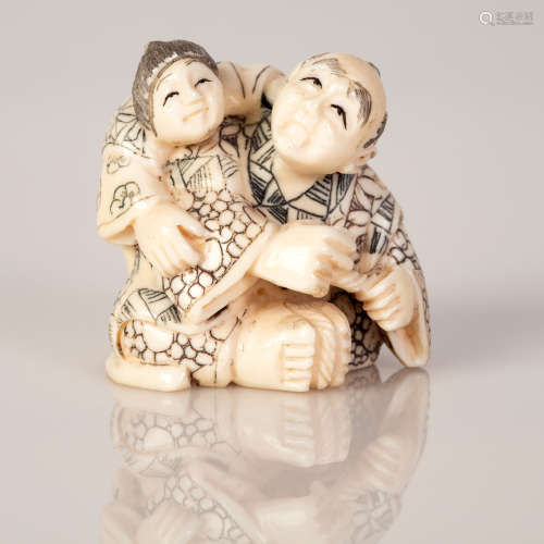 Old Bone Netsuke Child Holding His Father from the Back