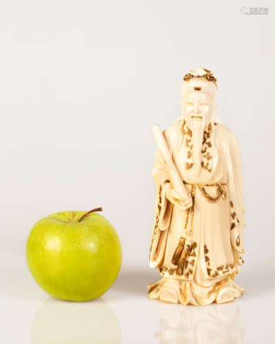 partially gilded Chinese bone sculpture of a wise man qing