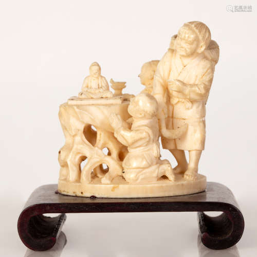 Old Japanese Bone Statuette in a Family Praying to Buddha Composition
