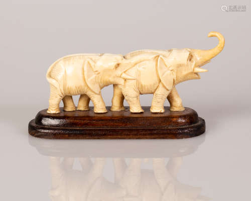 Japanese\Chinese Bone Statuette Couple of Elephants Moving in Line on Wooden Stand