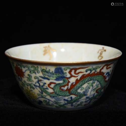 A Chinese Porcelain Doucai Cup With Gold Painting