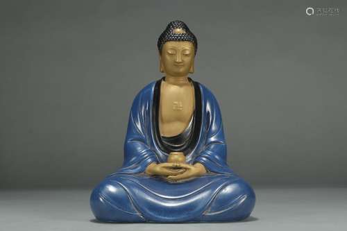 A Chinese Porcelain Blue Glazed Buddha Ornament With Marking