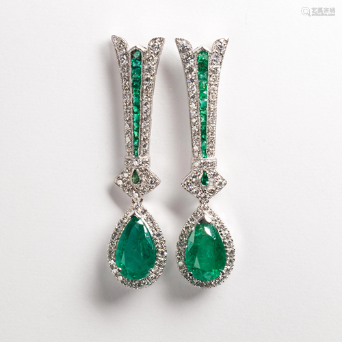 A pair of emerald, diamond and eighteen karat white