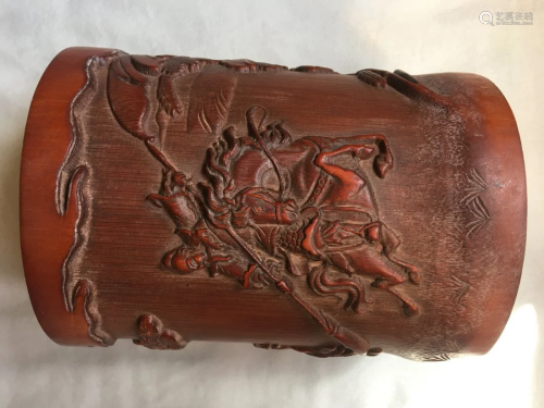 A Chinese Bamboo Brush Holder carved in Warriors,