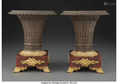 63113: A Pair of French Restoration Bronze Urns on Roug