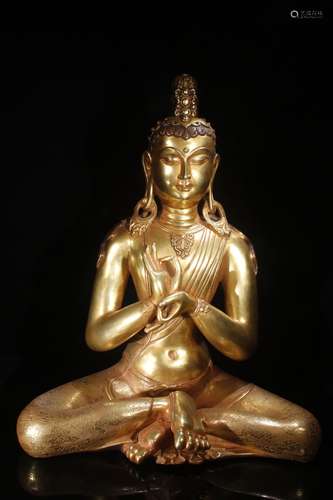 A Gilt Bronze Guanyin Statue