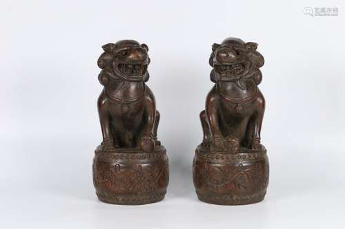 Pair Of Agarwood Beast Carved Ornaments