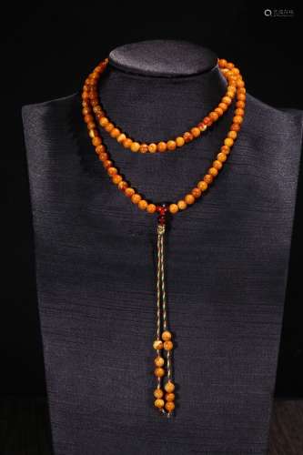 A Tibetan Amber 108-Bead Rosary
