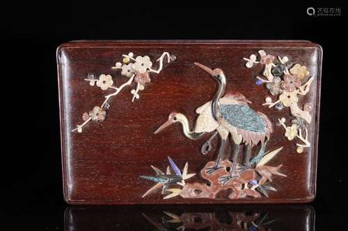 A Rosewood Box With Gems