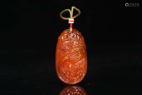 An Amber Auspicious Pendant