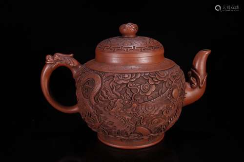 A Zisha Teapot With Dragon Carving