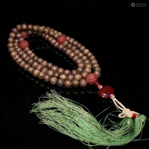 An Agarwood 108-Bead Rosary With Silver