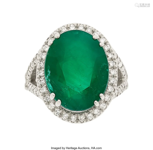 55261: Emerald, Diamond, White Gold Ring The ring feat