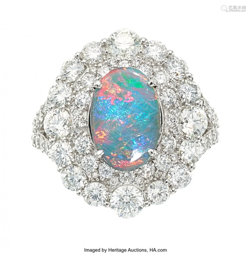 55174: Black Opal, Diamond, White Gold Ring The ring f