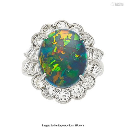 55188: Black Opal, Diamond, Platinum Ring The ring fe