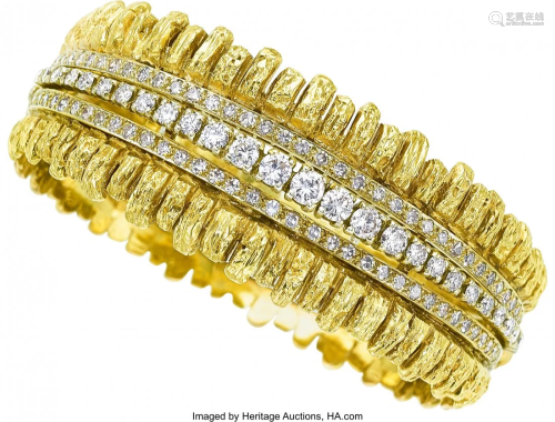 55060: Diamond, Gold Bracelet The bracelet features f