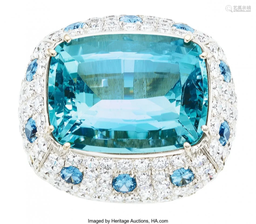 55176: Aquamarine, Diamond, Gold Ring The ring feature