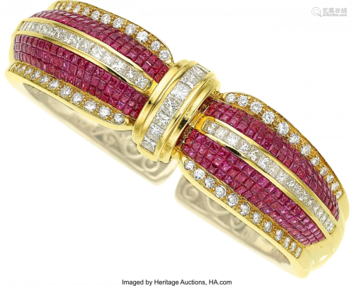 55259: Ruby, Diamond, Gold Bracelet The bracelet featu