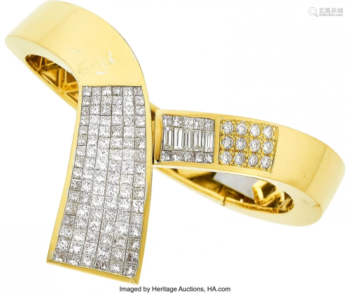 55045: Diamond, Gold Bracelet The hinged bangle featu