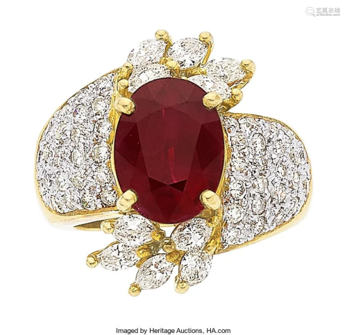 55358: Ruby, Diamond, Gold Ring The ring features an o