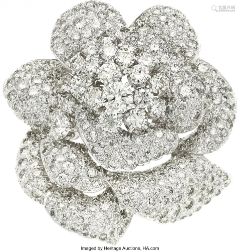 55084: Diamond, Platinum Brooch The flower brooch fea