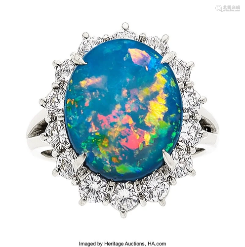 55328: Black Opal, Diamond, Platinum Ring The ring fea