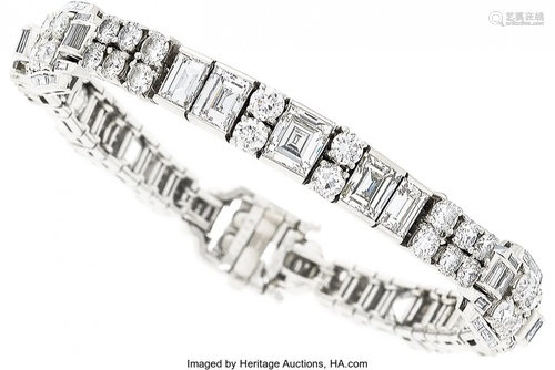 55314: Diamond, Platinum Bracelet The bracelet featur