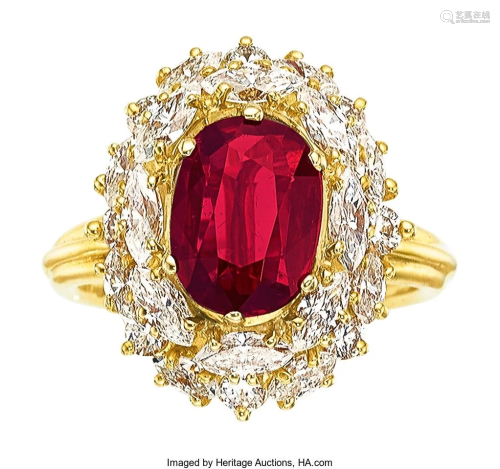 55334: Ruby, Diamond, Gold Ring The ring features an o