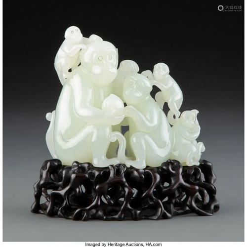 67031: A Chinese Carved White Jade Group of Monkeys on