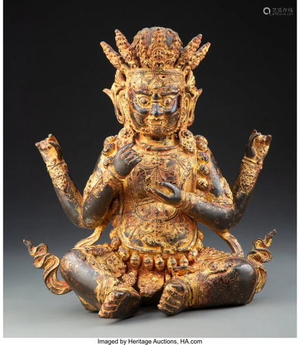 67315: A Tibetan Gilt Bronze Seated Figure of Mahakala