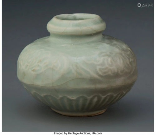 67111: A Chinese Celadon Jar 2-1/4 x 2-7/8 inches (5.7