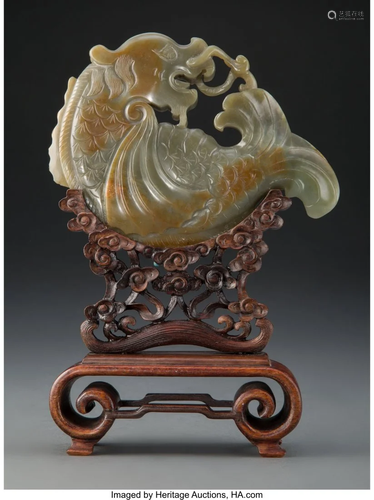 67035: A Chinese Carved Spinach Jade Dragon Fish Figure