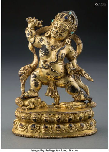 67312: A Tibetan Gilt Bronze Figure of Vajrapani, 14th