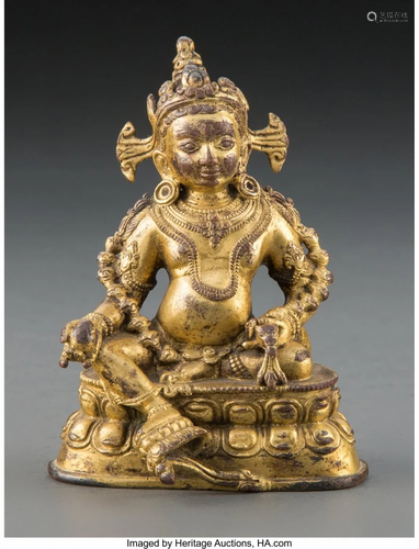 67313: A Tibetan Gilt Bronze Jambhala Figure, 19th-20th