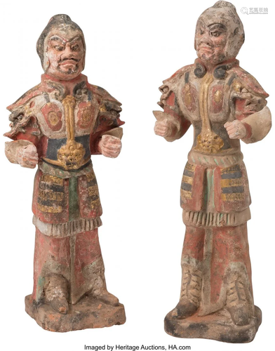 67084: A Pair of Chinese Painted and Gilded Pottery Lok