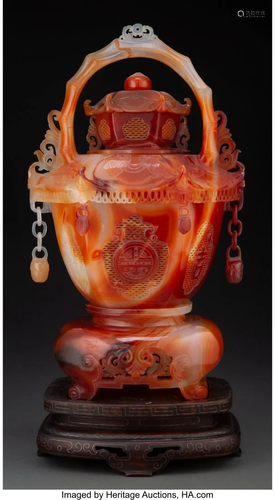 67076: A Chinese Carved Agate Basket on Carved Wood Sta