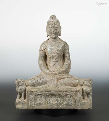 A Chinese grey veined marble Seated Buddha, in Northern Wei style,