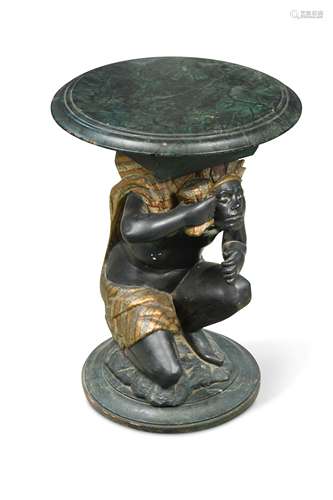 A small side table modelled as a blackamoor,