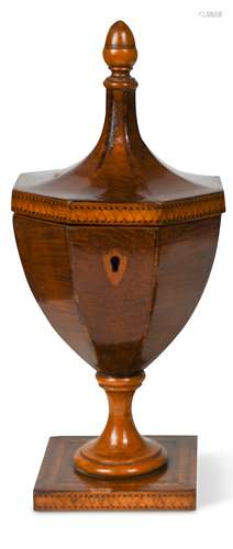 A George III partridge wood pedestal urn-shaped tea caddy,